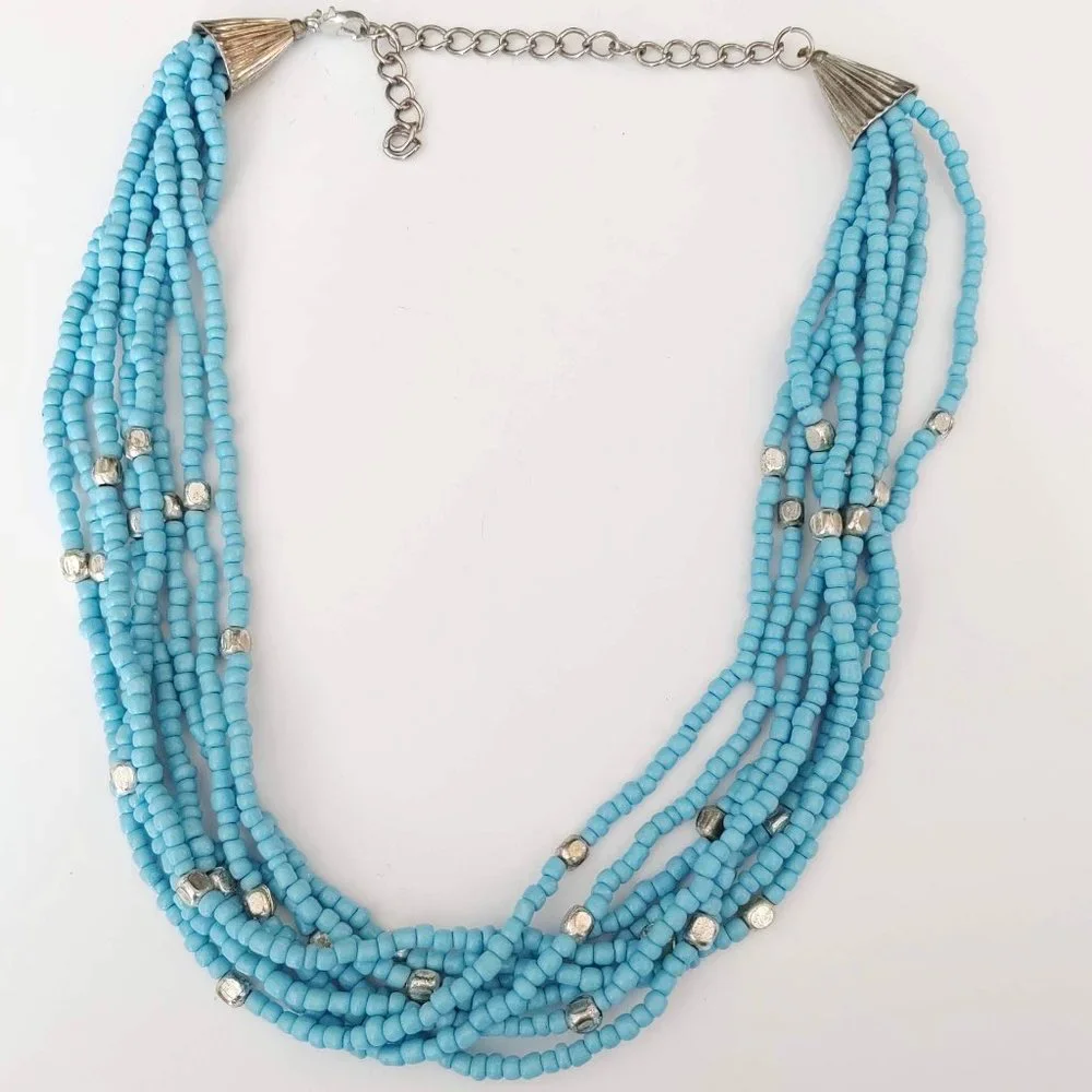 8 strand blue and silver beaded necklace